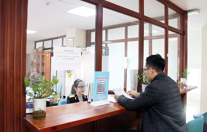 Người dân thực hiện thủ tục hành chính tại cơ quan thuế tỉnh Bắc Giang. Ảnh: Cục Thuế tỉnh Bắc Giang. 