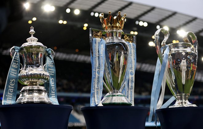 Bộ ba danh hiệu vĩ đại của Man City trong mùa giải 2022-2023. Ảnh: Independent