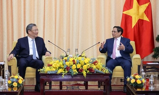 Thủ tướng Chính phủ và Bộ trưởng Bộ Thương mại Trung Quốc cùng đánh giá cao những kết quả hợp tác kinh tế, thương mại Việt Nam – Trung Quốc. Ảnh: VGP