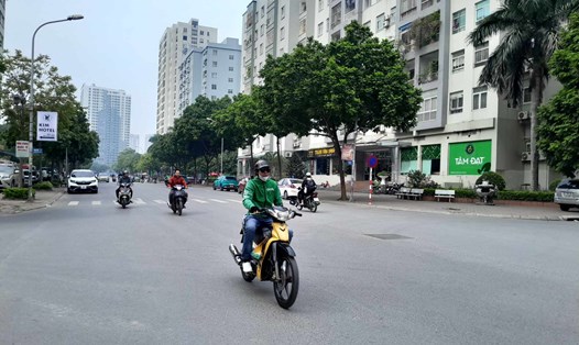 Nhiều người dân bày tỏ mong muốn bỏ bảo hiểm xe máy bắt buộc. Ảnh: Xuyên Đông