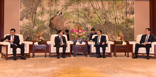 Phó Thủ tướng Chính phủ Trần Hồng Hà tiếp Thị trưởng Thành phố Thượng Hải Cung Chính. Ảnh: TTXVN
