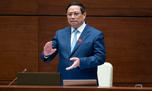 Thủ tướng Chính phủ Phạm Minh Chính trả lời chất vấn trước Quốc hội. Ảnh: Phạm Thắng/VPQH