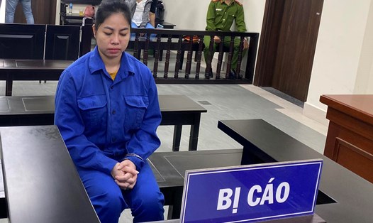Đinh Thị Quỳnh tại phiên toà xét xử về hành vi lừa đảo. Ảnh: Quang Việt