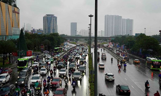 Sáng nay, Hà Nội có mưa, trời chuyển rét, Chất lượng không khí tại Hà Nội được cải thiện. Ảnh: Hữu Chánh