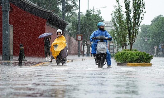 Mưa lớn ở Bắc Kinh, Trung Quốc, ngày 30.7.2023. Ảnh: Xinhua