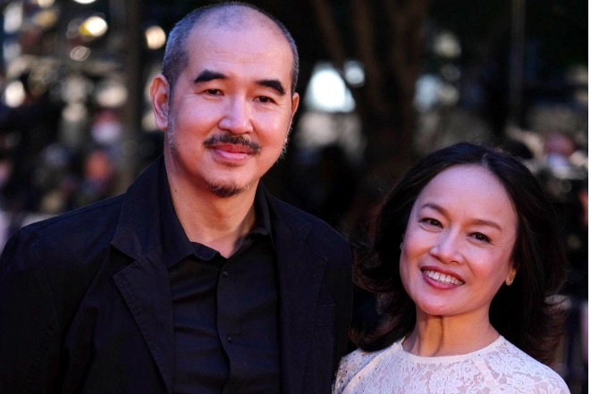 Đạo diễn Bùi Thạc Chuyên và vợ. Ảnh: Facebook nhân vật