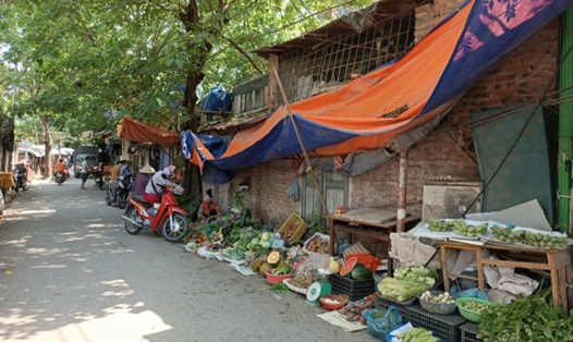 Hà Nội siết chặt an toàn thực phẩm ở chợ dân sinh. Ảnh: Thu Giang