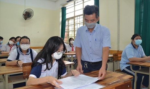 Thí sinh dự thi tuyển sinh lớp 10 năm 2022 tại điểm thi Trường THCS Lê Văn Tám, TPHCM. Ảnh: Huyên Nguyễn