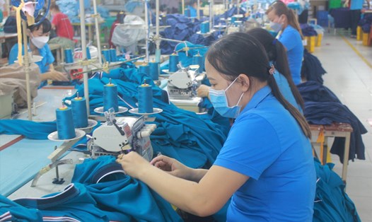 Công nhân Công ty Hoàng Gia G.M.T tại Khu công nghiệp Sông Mây, huyện Trảng Bom, tỉnh Đồng Nai. Ảnh: Hà Anh Chiến