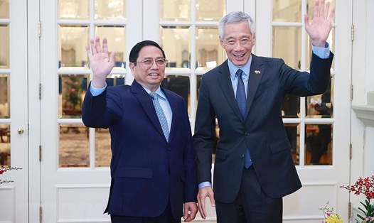 Thủ tướng Singapore Lý Hiển Long đón, hội đàm với Thủ tướng Phạm Minh Chính. Ảnh: TTXVN