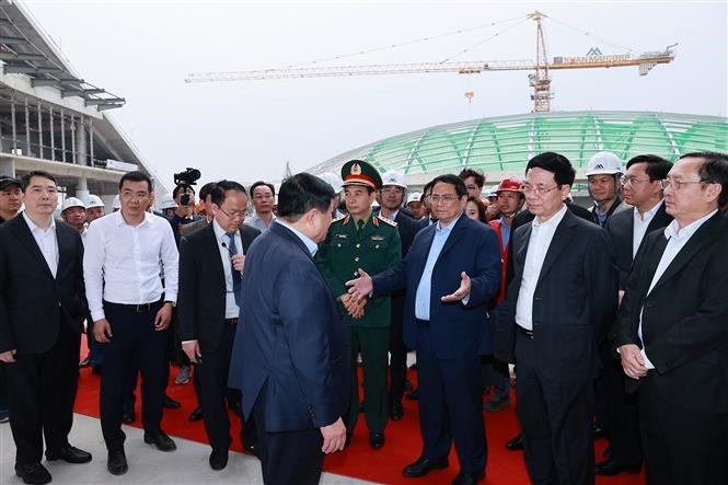 Thủ tướng Phạm Minh Chính thăm công trường dự án Trung tâm Đổi mới sáng tạo Quốc gia tại Khu Công nghệ cao Hoà Lạc. Ảnh: Dương Giang/TTXVN