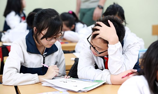 Bộ GDĐT nghiêm cấm giáo viên dạy thêm chính học sinh của mình. Ảnh minh hoạ: Hải Nguyễn