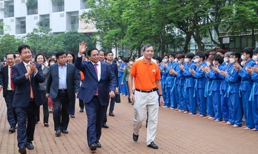 Thủ tướng Phạm Minh Chính thăm và làm việc với trường Đại học FPT và Công ty TNHH Phần mềm FPT. Ảnh: VGP