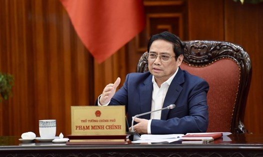 Thủ tướng Phạm Minh Chính yêu cầu Ngân hàng Nhà nước ban hành ngay 2 Thông tư quan trọng. Ảnh: VGP