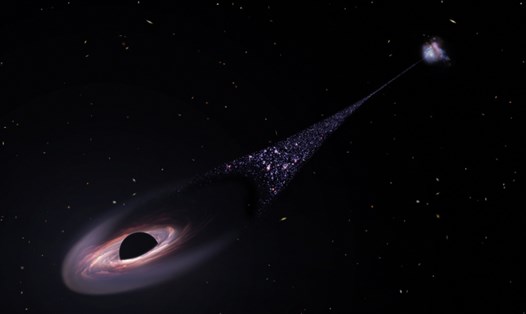 Hố đen siêu lớn bị đẩy ra khỏi thiên hà chủ do sự va chạm với 2 hố đen khác. Ảnh: NASA