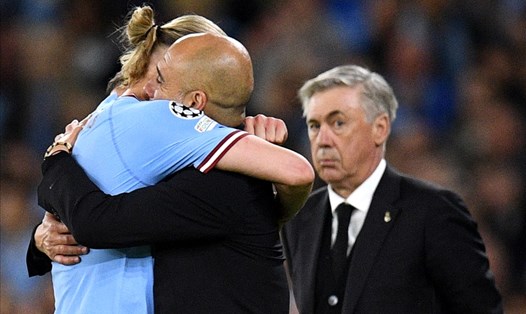 Niềm vui của Haaland và Pep trước sự bất lực của Ancelotti. Ảnh: AFP
