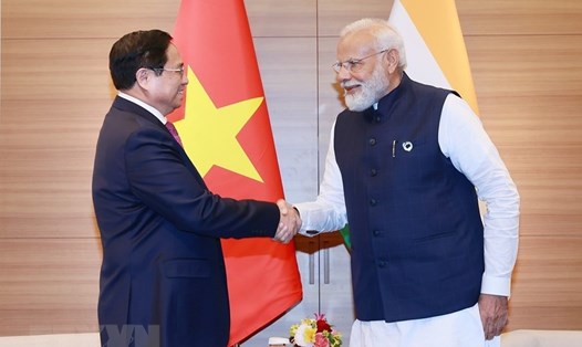 Thủ tướng Chính phủ Phạm Minh Chính và Thủ tướng Ấn Độ Narendra Modi. Ảnh: TTXVN