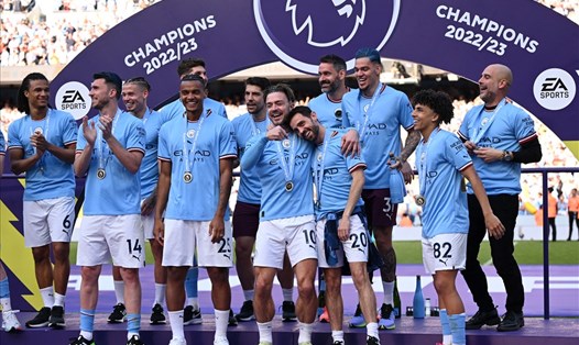 Man City có lần thứ ba liên tiếp vô địch Premier League.  Ảnh: AFP