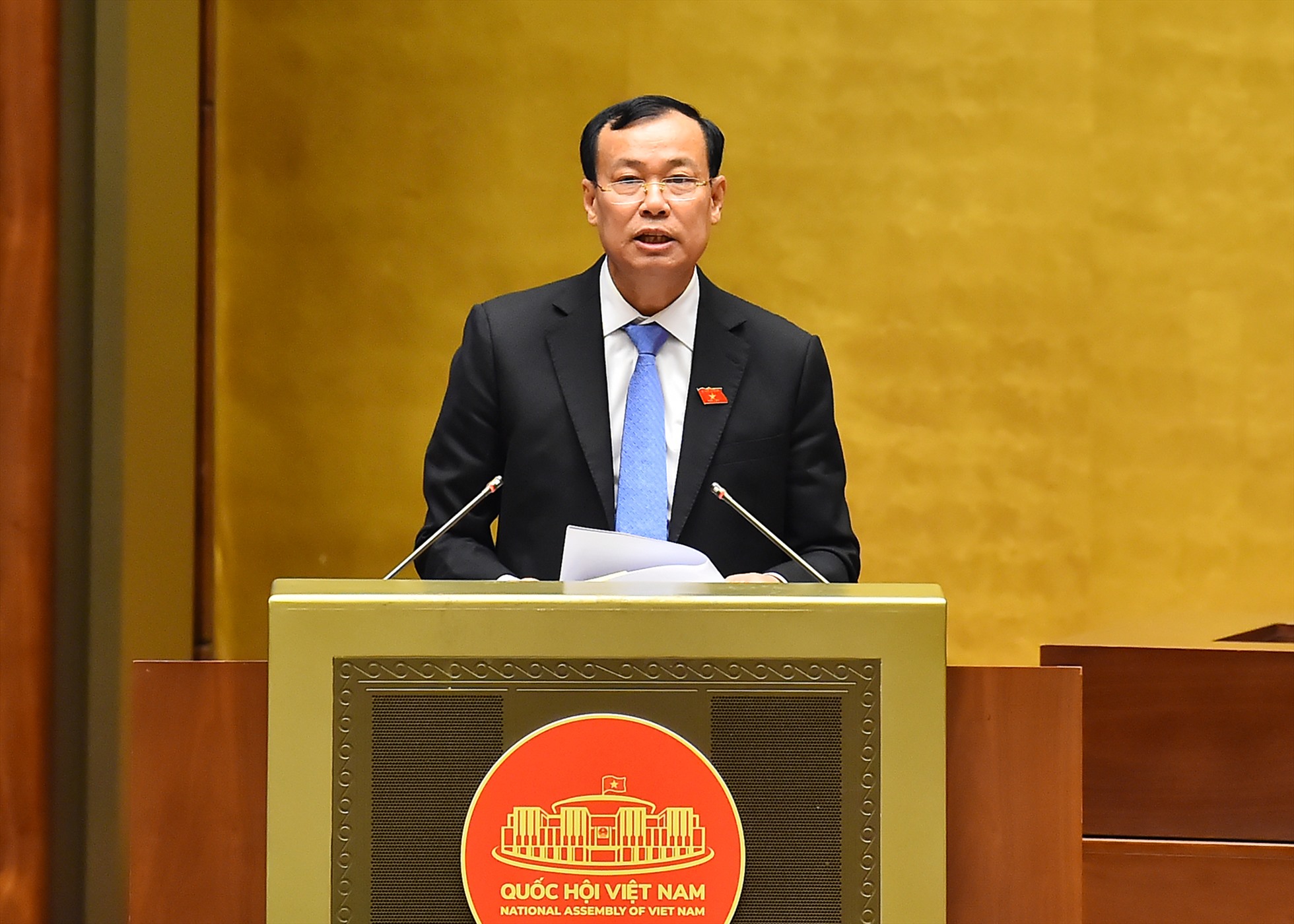 Chủ nhiệm Ủy ban Quốc phòng và An ninh của Quốc hội Lê Tấn Tới báo cáo. Ảnh: Phạm Đông