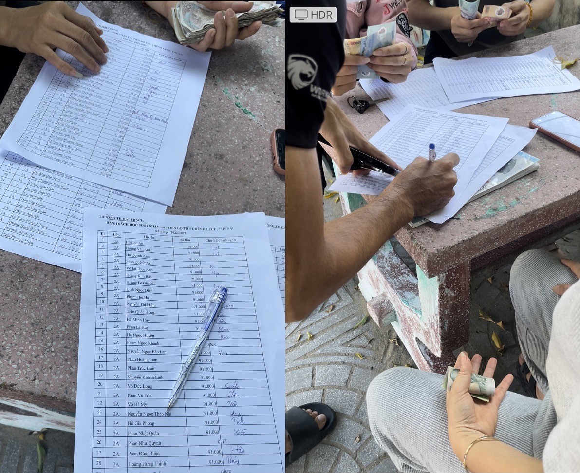 Các phụ huynh ký nhận lại tiền vào sáng 1.6. Ảnh: Hồng Thiệu