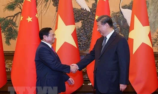 Thủ tướng Chính phủ Phạm Minh Chính và Tổng Bí thư, Chủ tịch Trung Quốc Tập Cận Bình. Ảnh: TTXVN