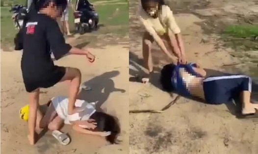 Hai nữ sinh Trường THCS Hưng Bình bị đánh hội đồng.  Ảnh: Cắt từ video