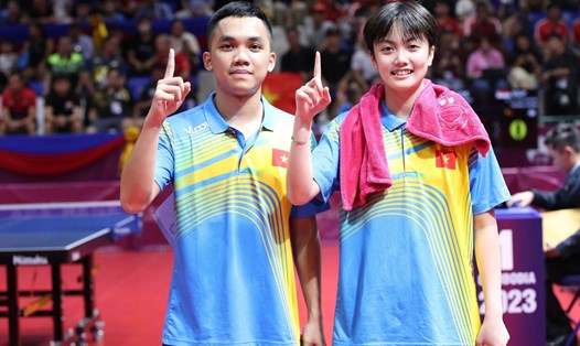 Trần Mai Ngọc và Đinh Anh Hoàng là thành viên Đội tuyển Bóng bàn Việt Nam tại SEA Games 32. Ảnh: Nguyễn Đăng