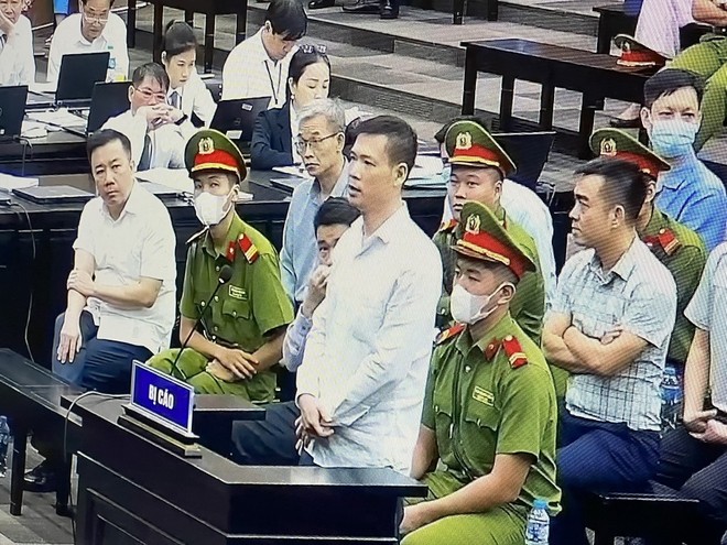 Bị cáo Trần Minh Tuấn phủ nhận cáo buộc, cho rằng bản thân bị oan. Ảnh chụp qua màn hình