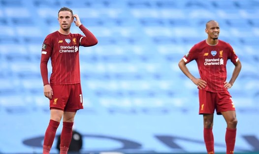 Fabinho và Henderson có thể rời Liverpool trong cùng một thời điểm. Ảnh: AFP