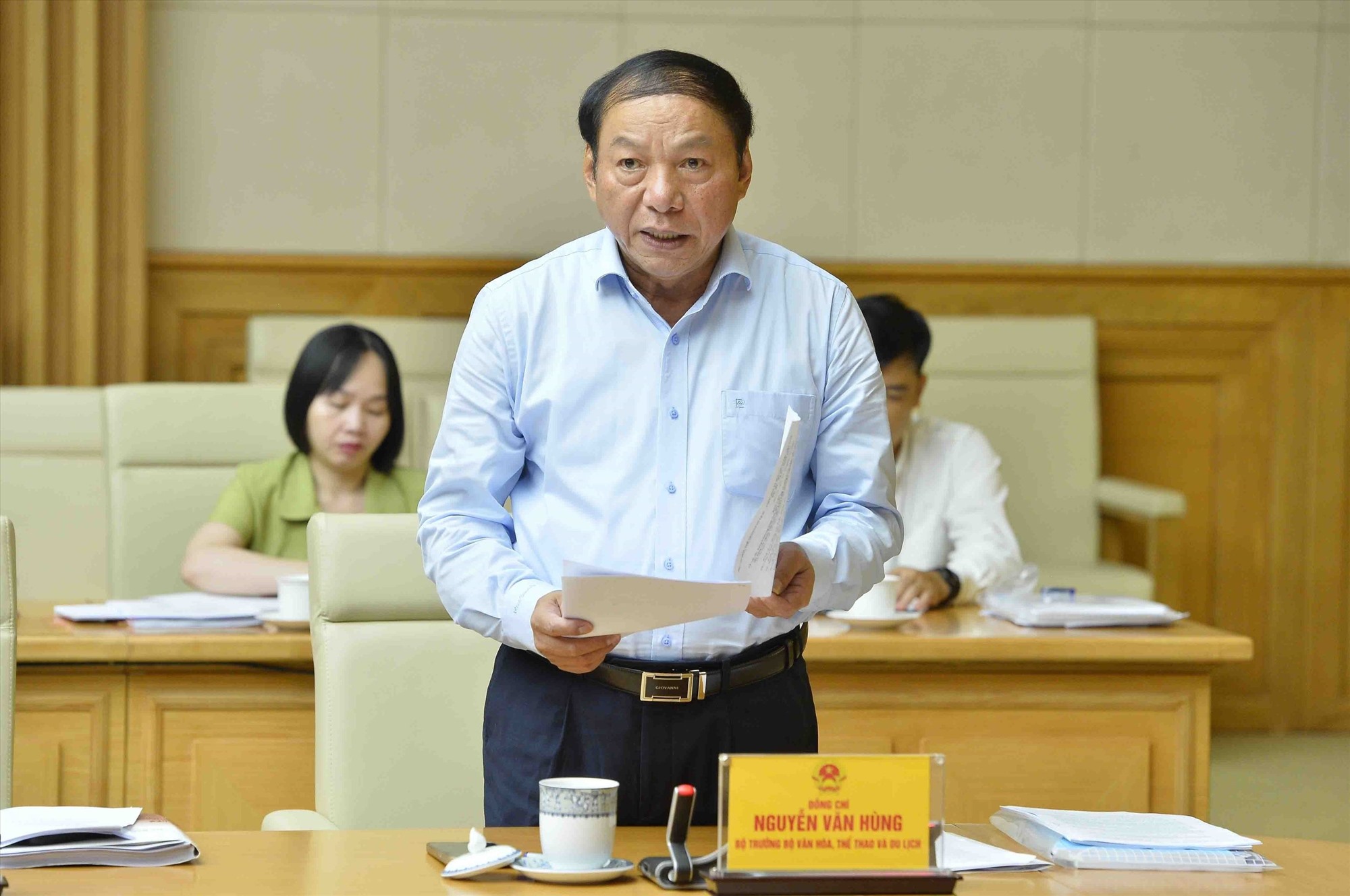 Bộ trưởng Bộ Văn hóa, Thể thao và Du lịch Nguyễn Văn Hùng báo cáo. Ảnh: TTXVN