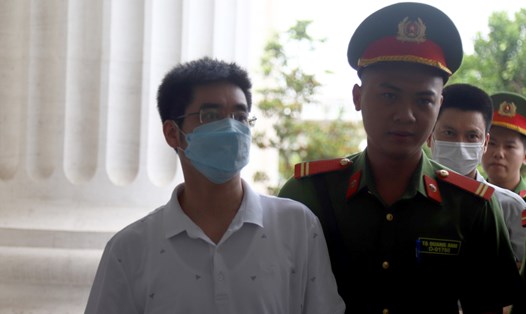 Bị cáo Hoàng Văn Hưng hôm bị dẫn giải vào phòng xử nghe toà tuyên án (ngày 28.7). Ảnh: Quang Việt
