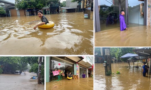 Nhiều tuyến phố trên địa bàn thành phố Lào Cai bị ngập sâu khiến giao thông tê liệt, người dân phải dùng phao để đi lại. Ảnh: NDCC