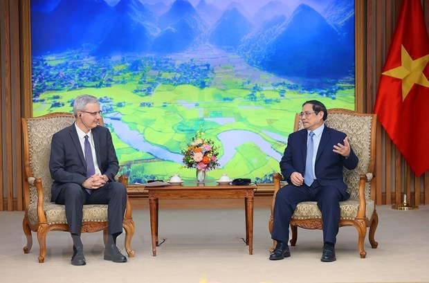 Thủ tướng Phạm Minh Chính chúc mừng Đại sứ đã có nhiệm kỳ công tác thành công tốt đẹp tại Việt Nam. Ảnh: TTXVN