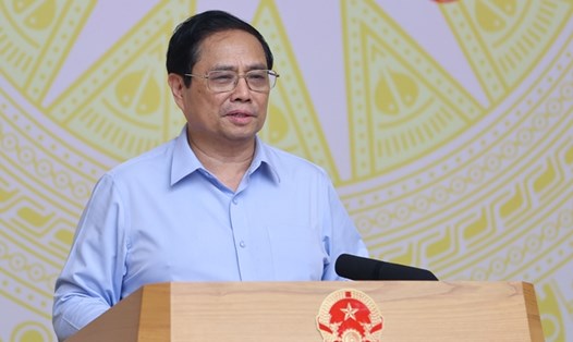 Thủ tướng Phạm Minh Chính chủ trì cuộc làm việc của Thường trực Chính phủ với Ban Chấp hành Hiệp hội SME Việt Nam. Ảnh: VGP