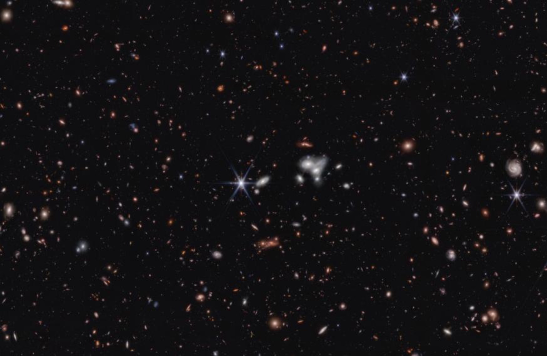 Kính viễn vọng James Webb chụp được hố đen siêu lớn ở xa Trái đất nhất