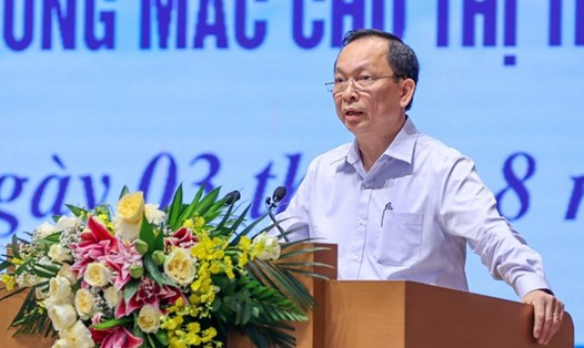 Phó Thống đốc Ngân hàng Nhà nước Việt Nam Đào Minh Tú báo cáo tại hội nghị. Ảnh: VGP