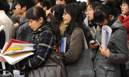 Các trường đại học, cao đẳng Trung Quốc đang phải đối diện áp lực nặng nề về vấn đề việc làm cho sinh viên mới ra trường. Ảnh: AFP