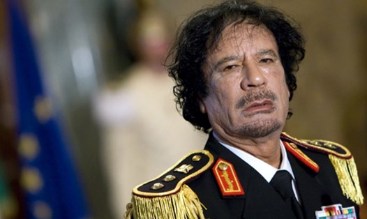 Nhà lãnh đạo Libya Muammar Gaddafi trong một cuộc họp báo ở Rome, Italy, ngày 10.6.2009. Ảnh: Xinhua