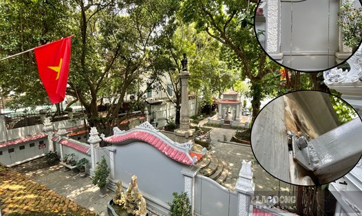 Bức tường và cánh cổng sắt chặn đường thông từ Khu tưởng niệm vua Lê sang Đình Nam Hương bên bờ hồ Hoàn Kiếm. Ảnh: Khánh Linh