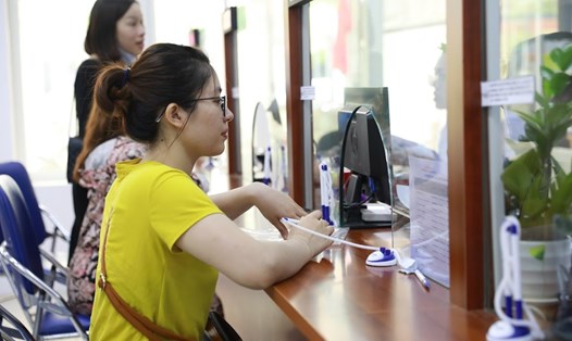 Cắt giảm thực chất các thủ tục hành chính để thuận tiện cho người dân, doanh nghiệp. Ảnh: Hải Nguyễn