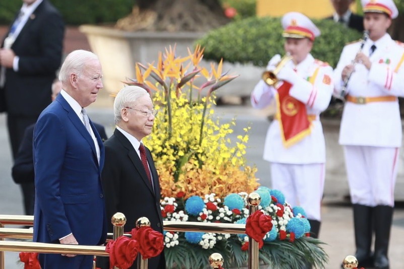Tổng Bí thư Nguyễn Phú Trọng chủ trì lễ đón Tổng thống Mỹ Joe Biden. Ảnh: AFP