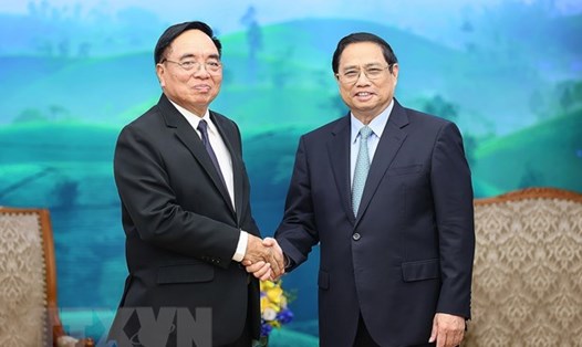 Thủ tướng Chính phủ Phạm Minh Chính tiếp Bộ trưởng Kế hoạch và Đầu tư Lào Khamchen Vongphosy. Ảnh: TTXVN