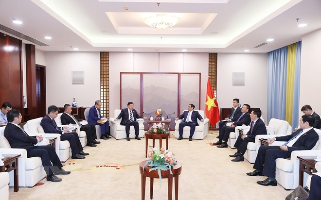 Thủ tướng Chính phủ Phạm Minh Chính đã tiếp lãnh đạo một số tập đoàn kinh tế hàng đầu Trung Quốc trong lĩnh vực công nghệ, năng lượng và phát triển hạ tầng. Ảnh: TTXVN