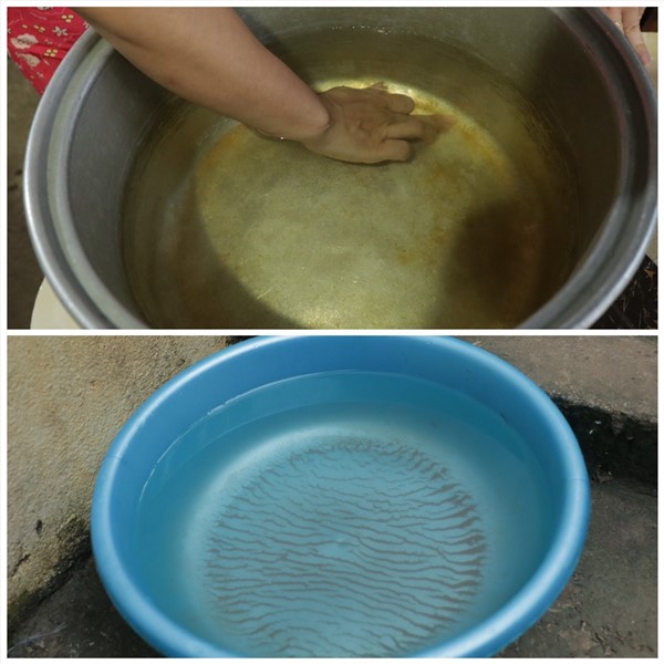 Nước được người dân giữ lại sau khi phát hiện nước có mùi, màu lạ. Ảnh: Minh Nguyễn
