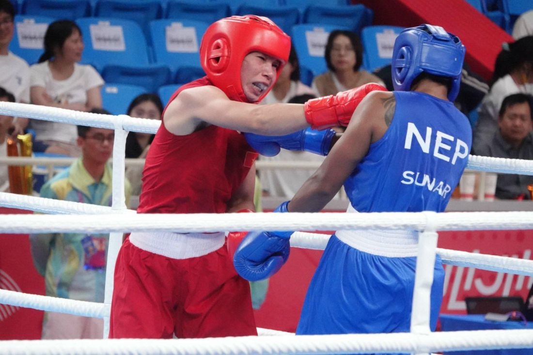 Võ sĩ Hà Thị Linh giành quyền vào vòng 1/8 hạng cân 60kg nữ. Ảnh: Nam Trung