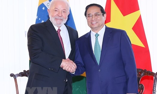 Thủ tướng Chính phủ Phạm Minh Chính với Tổng thống Brazil Lula da Silva. Ảnh: TTXVN