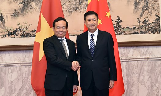 Phó Thủ tướng Trần Lưu Quang và Bộ trưởng Bộ Công an Trung Quốc Vương Tiểu Hồng. Ảnh: VGP