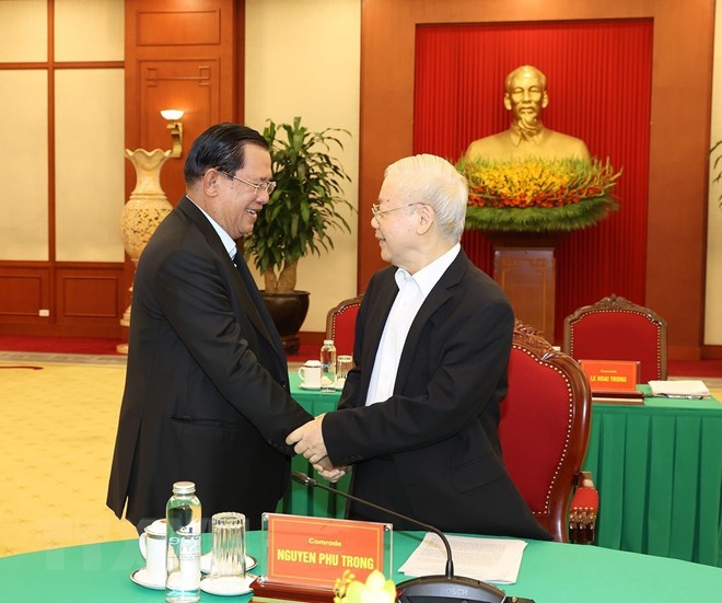 Tổng Bí thư Nguyễn Phú Trọng và Chủ tịch Đảng Nhân dân Campuchia (CPP) Samdech Techo Hun Sen. Ảnh: TTXVN
