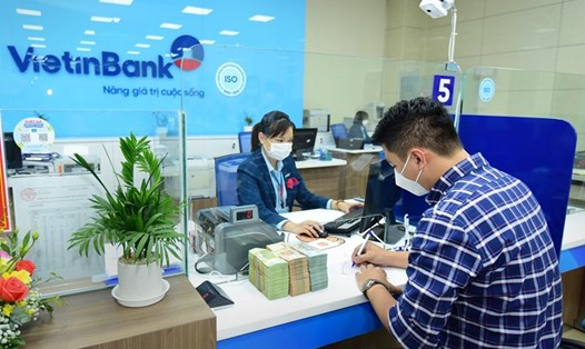 Các ngân hàng đua nhau hút khách vay trả nợ ngân hàng khác với mức lãi suất thấp. Ảnh: Vietinbank
