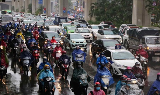 Dự báo Hà Nội có mưa nhỏ trong sáng mai 15.1. Ảnh minh họa: Hữu Chánh. 